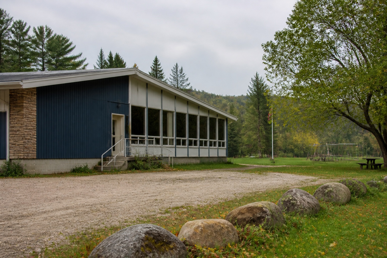 A mid-century community centre beside a quiet northern Ontario park